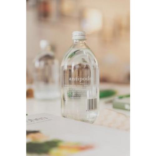 Antipodes water still with fine dining background